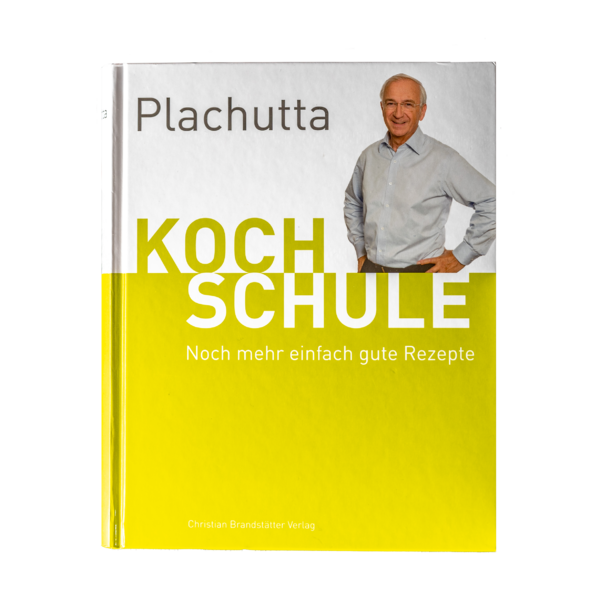 Modern carport with flat roof, wooden ceiling and tiled floor under blue sky, partially visible tree.